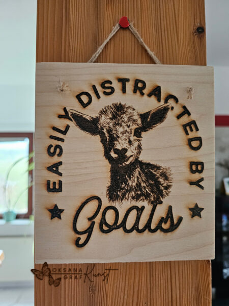 Gravur auf holz: easily distracted by goats, Ziege