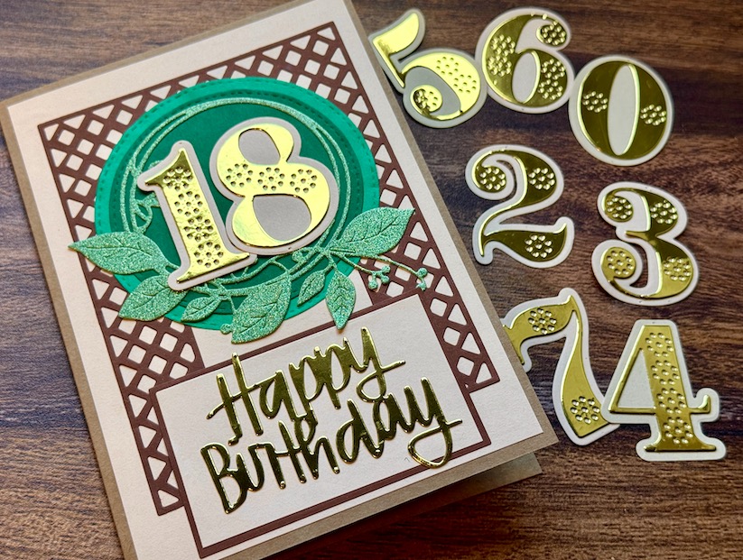 Handgemachte Geburtstagskarte in Braun und Grün mit goldglänzender '18' und dazu passenden goldenen Zahlen zum Personalisieren des Alters. Mit 'Happy Birthday'-Schriftzug.